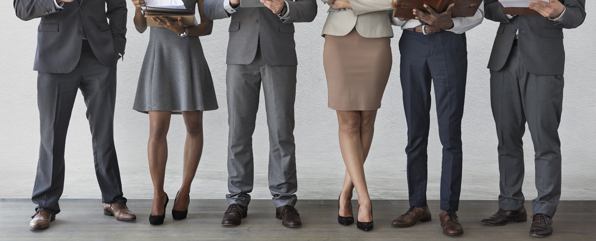 Bottom half of professionals standing together